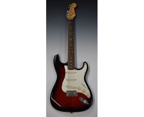 Conrad electric guitar in the style of a Fender Stratocaster