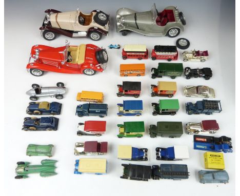 Thirty-five Tootsietoy, Burago and similar diecast model vehicles together with a set of Dinky Toys One Dozen Tyres 10253, in