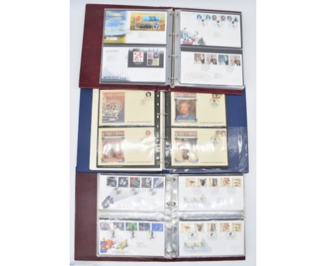 A collection of GB first day covers in four albums and a further Royal family album.