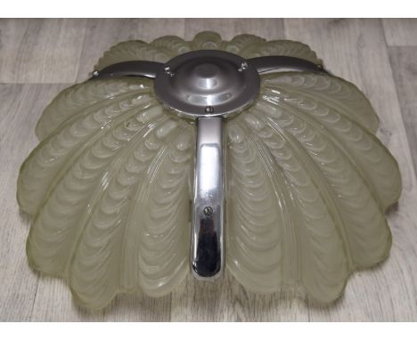 Art Deco glass lamp with three ribbed or shell shaped glass sections, supported on chains, diameter 37cm