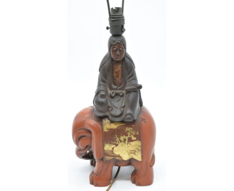 Japanese lacquer lamp in the form of a female figure atop an elephant with gilt decoration, H34cm excluding fitting