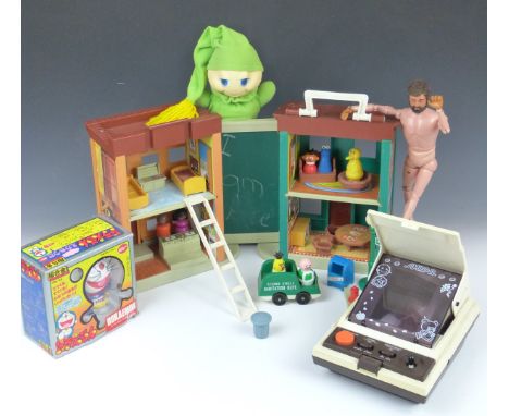 A collection of vintage toys comprising Doraemon GB-04, 1970s Glo Worm night light, CGL Amidar, Action Man and Fisher Price S