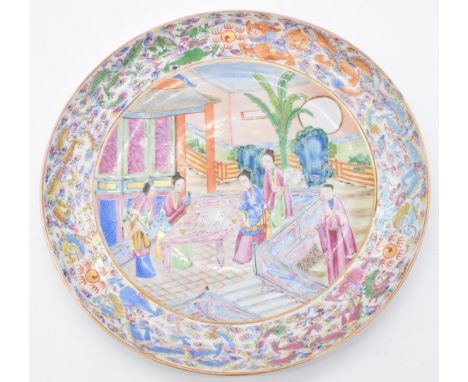 Chinese 19thC&nbsp;famille rose plate depicting two Chinese ladies playing 'go' at a table with three ladies spectating and d