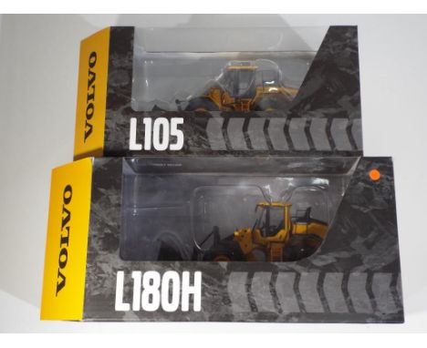 Diecast - two Volvo L105 excavators in original window boxes by Motorart 1:50 scale, both models appear to be in mint conditi