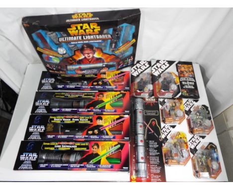 Star Wars - Hasbro - a collection of six Star Wars light sabers and six Star Wars action figures in original blister packs by