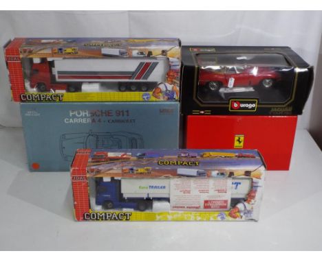 Diecast - two Joal 0:50 scale trucks and three 1;18 scale diecast vehicles to include a Porsche 911 by Anso, models appear to