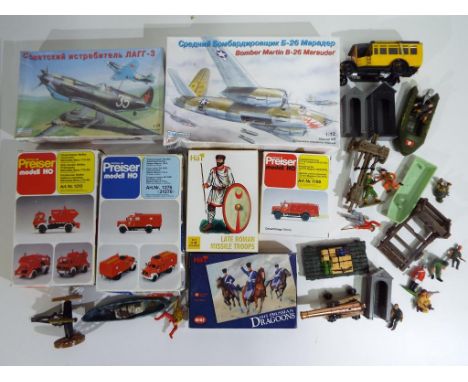 Model Kits - seven plastic kits comprising three commercial vehicles by Preiser, two aeroplanes by Eastern Express, two boxes