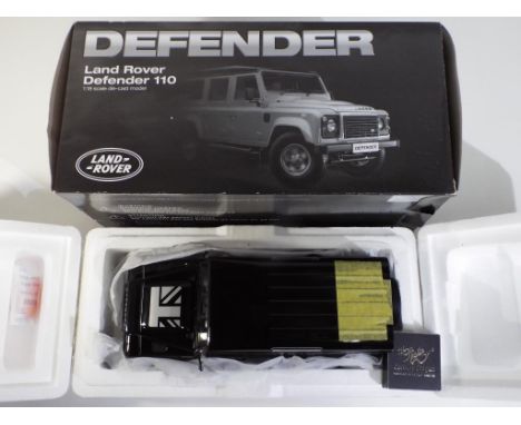 Diecast - a Land Rover Defender 110 in original box in 1:18 scale by Dorlop, model appears to be in mint condition, in excell