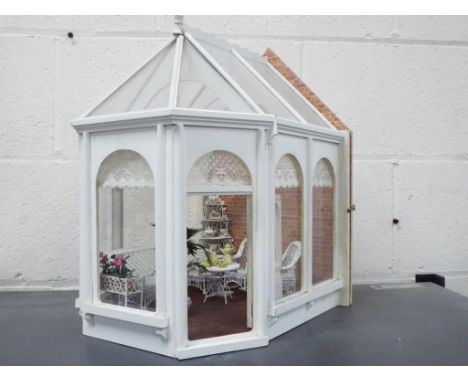 Dolls Houses - a wooded conservatory with opening back with furniture, approximate height 41 cm x 33 cm [width] x 29 cm [dept