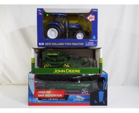 Diecast - a good mixed lot to include Pauls Modl Art 1:18 scale Jaguar XKR from James Bond Die Another Day, a John Deere 1:16