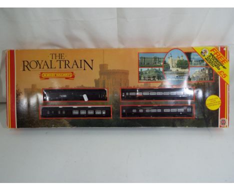 Model Railways - Hornby OO gauge The Royal Train with Lima Class 47 diesel named Prince William, items appear to be in excell