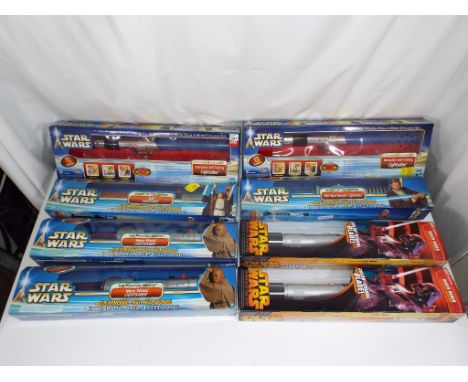Star Wars - Hasbro  - a collection of eight boxed Star Wars Light Sabers by Hasbro, lot includes Attack Of The Clones, Obi-Wa