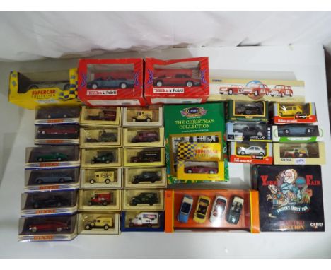 Diecast - 32 diecast vehicles in original boxes to include Dinky MGB, 1955 Bentley, Ford Mustang, a Tonka 1:25 scale Jaguar X