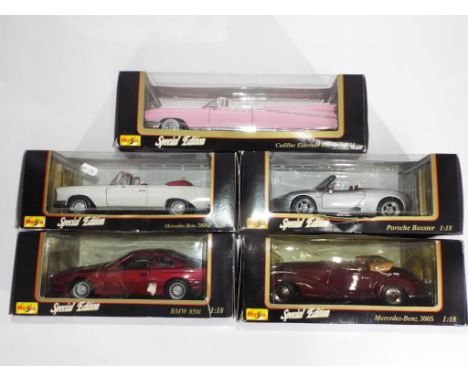 Diecast - five Maisto 1:18 scale cars in original boxes to include BMW 850i, Porsche Boxster  Cadillac Eldorado and others, m