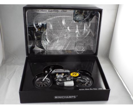 Diecast - a Minichamps 1:12 scale Norton Manx Ray Petty 1960 motorbike, model appears mint in mint box. Estimate £60 - £80