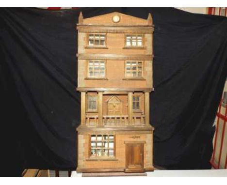 Dolls Houses - a wooden house with four floors featuring three opening fronts with some furniture [please note, this item wil