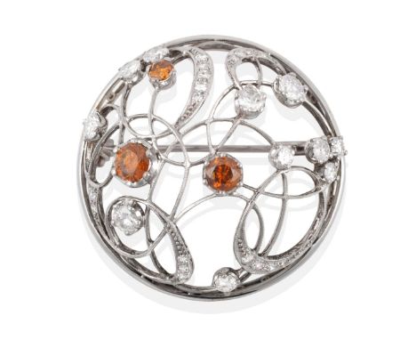 A Russian Diamond Brooch, a domed circular frame of millegrain and diamond set scrolls terminating in white and fancy orange 