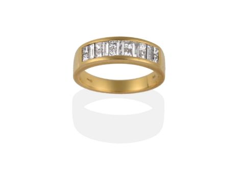 An 18 Carat Gold Diamond Half Hoop Ring, pairs of princess cut diamonds alternate with baguette cut diamonds in a yellow chan