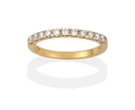 An 18 Carat Gold Diamond Half Hoop Ring, the round brilliant cut diamonds in yellow claw settings to a plain polished band, t