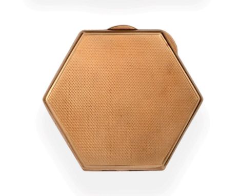 A 9ct Gold Lady's Powder Compact, Goldsmiths &amp; Silversmiths, Birmingham 1934, hexagonal with engine turned decoration, co