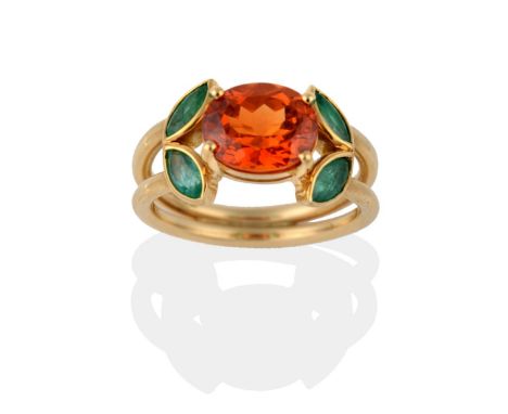 An 18 Carat Gold Spessartine Garnet and Emerald Ring, the oval cut orange garnet in yellow claws, with four marquise cut emer