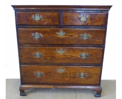 George III oak chest of two short and three long graduated drawers, top with burr oak cross banding, drawers with original st