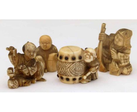 Japanese ivory netsuke of a drum and three small carved ivory figures (4)