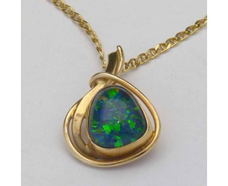 10ct gold mounted opal triplet pendant on a 375 gold chain.