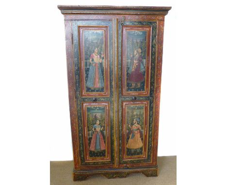 Early 20th century Indian painted two door cupboard, raised and fielded panels to doors with portrait panels, decorated all o