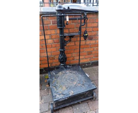 Set of cast iron sack scales of wheels.
