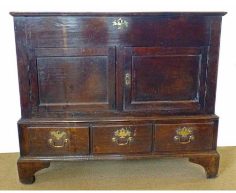George III oak gary chest, hinged two plank pleated lid above two single panel drawers, all standing on base with three deep 