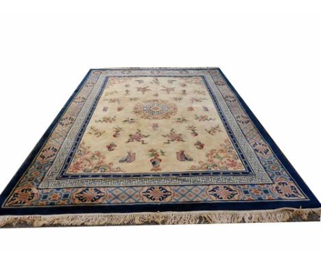 Chinese carpet, the ground of auspicious objects within a blue border, width 273cm. Condition report: stained, damp damage.He