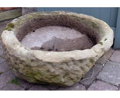 Circular sandstone trough 67cm diameter and 25cm high.