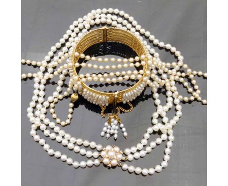 Unmarked Indian yellow metal lattice bangle set with a continuous band of baroque pearls; cultured pearl three-stand necklace