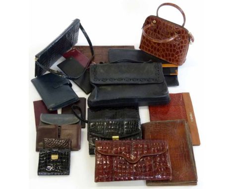 A collection of vintage and retro clutch bags wallets, card holders etc. (20).    Condition report:  Condition worn and used 