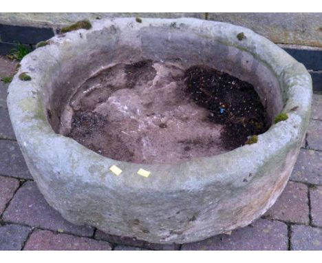 Circular sandstone trough 65cm diameter and 25cm high.