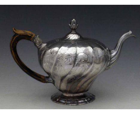 Continental silver inverted pear shaped teapot with an ebonised wood handle, marks unclear, diameter 14cm, gross weight 26oz 