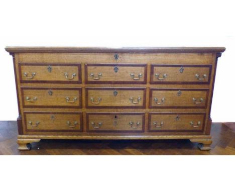 George III oak mahogany cross banded Lancashire chest, front with six false drawers above three true drawers, flanked by quar