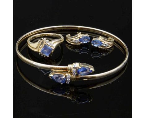 Tanzanite and diamond bangle, dress ring and pair of earrings in 14k and unmarked gold, gross weight 12.3g