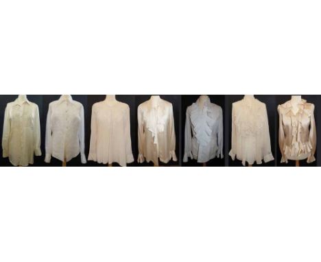 7 ladies white and cream blouses, 3 silk and 4 other by various designers including Ralph Lauren, Escada, Selene, Mariella Bu