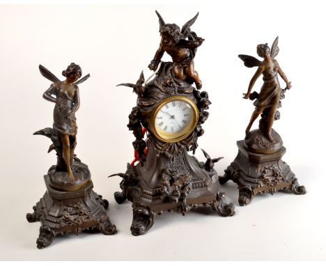 An ornate late 19th century sculptural spelter clock garniture retailed by Pridham & Sons, Torquay.