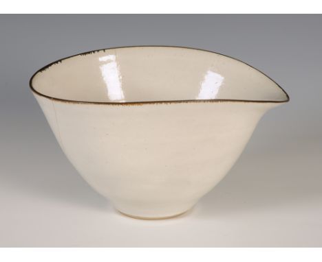 Dame Lucie Rie D.B.E., a bowl with manganese rim and overall white glaze, potter's seal.  Maximum width 26cm, maximum height 