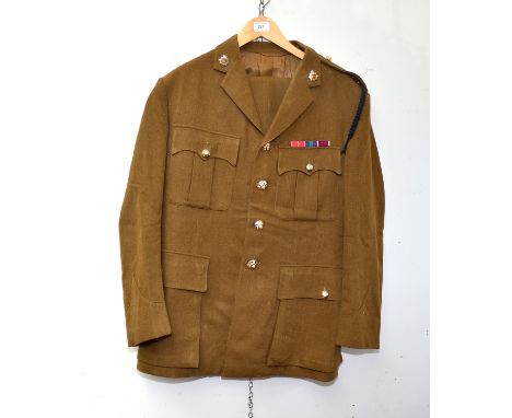 A 'Royal Corps of Transport' green wool uniform with embroidered Parachute Regiment badge to the top of the right arm, togeth