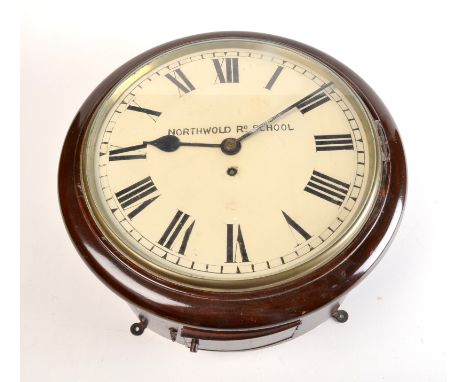 A mahogany dial clock with a brass single pewsey movement, the dial inscribed 'Northwold Road School'.  Dial diameter 29.5cm.