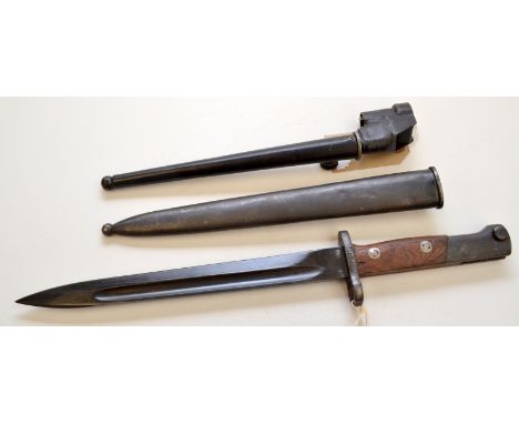 A WWII German K98 bayonet with metal sheath, and a similar British bayonet with scabbard.