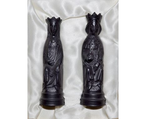 A pair of Wedgwood basalt chess pieces, King and Queen, designed by Machin, original box. 