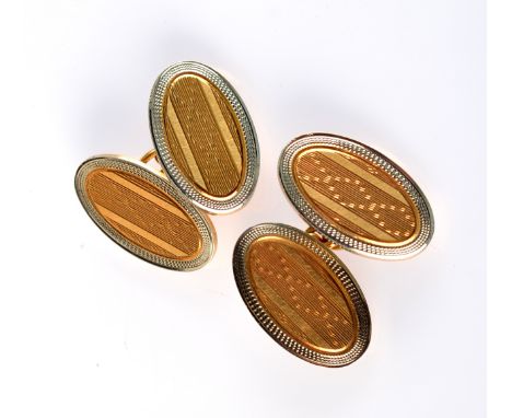 A pair of 18ct. gold cufflinks, 12.3gms.