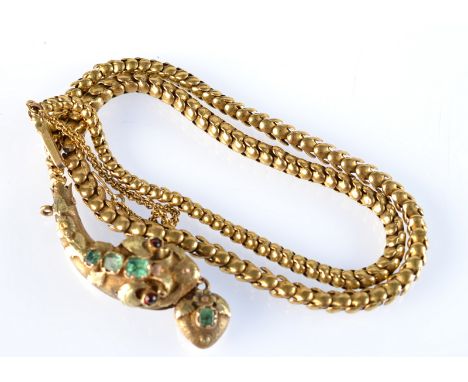A Victorian gold snake necklace, with graduated links, the snake's head with applied foliage, graduated emeralds and ruby eye