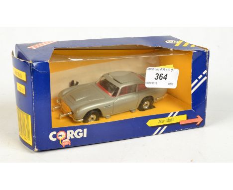 A modern Corgi model of James Bond's Aston Martin.
