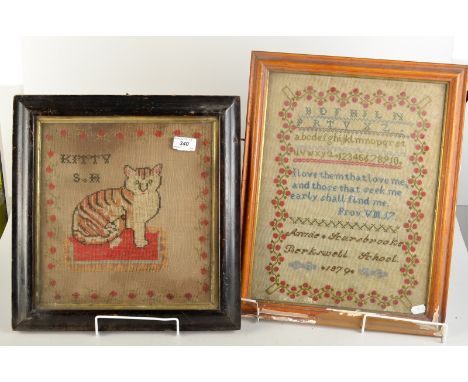 A late 19th century woolwork sampler with an alphabet and numbers, above a verse by Annie Scarsbrook, Berkswell School 1879 a